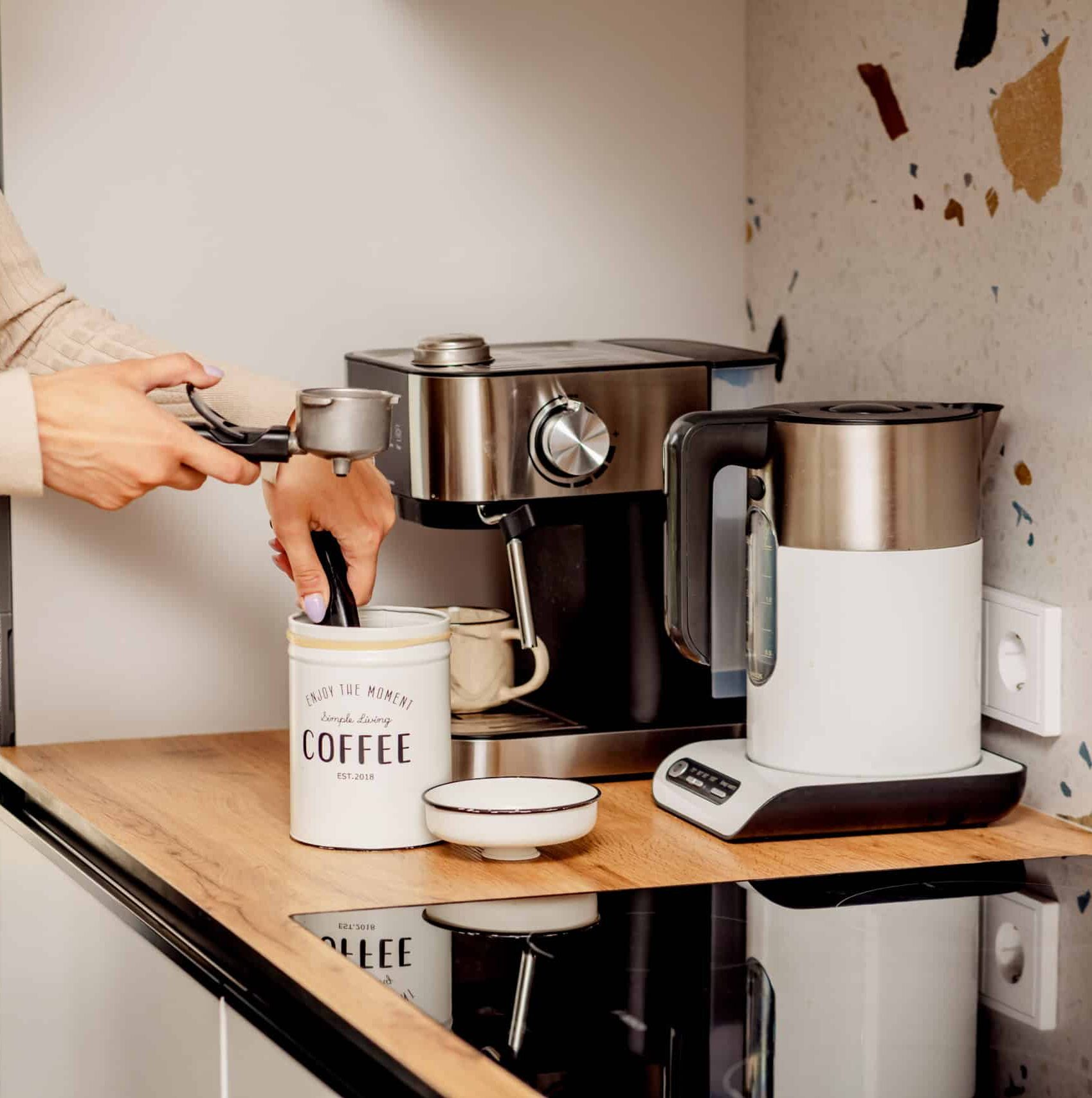 The process of making coffee at home. Coffee machine. Ground coffee.